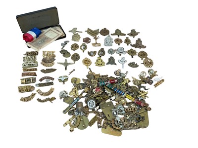 Lot 723 - Collection of British military cap badges, shoulder titles and related badges to include Royal Corps of Signals, RAF and ATS (1 box).