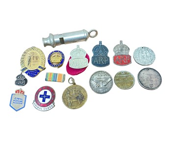 Lot 724 - Three Second World War silver ARP badges, ARP whistle and related badges and Militaria.