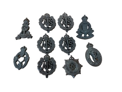 Lot 725 - Group of ten Second World War wartime economy issue plastic cap badges for ATS, REME and others (10)