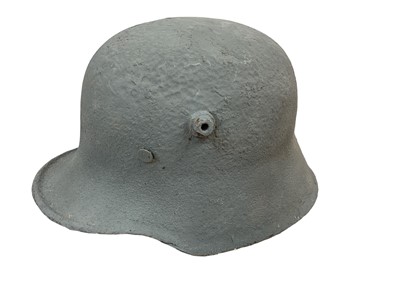 Lot 731 - First World War Imperial German M16 pattern steel helmet, later repainted.