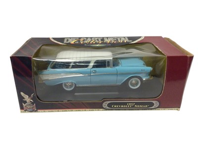 Lot 1857 - Selection of 1:18 scale die cast American Cars by various manufacturers including 1957 Chevrolet Nomad, 1953 Packard Caribbean, 1949 Buick, 1961 Impala, 1957 Ford fairlane Skyliner and 1957 Chevrol...