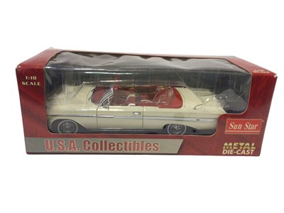 Lot 1857 - Selection of 1:18 scale die cast American Cars by various manufacturers including 1957 Chevrolet Nomad, 1953 Packard Caribbean, 1949 Buick, 1961 Impala, 1957 Ford fairlane Skyliner and 1957 Chevrol...