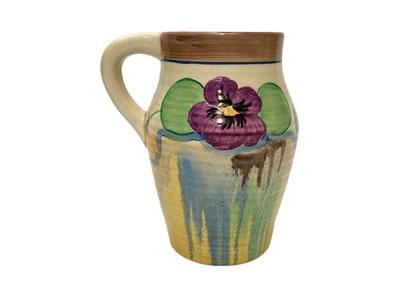 Lot 1158 - Clarice Cliff Newport Pottery Bizarre range pansies jug with hand painted decoration, 15.5cm high