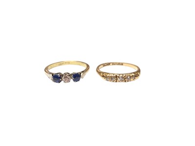 Lot 32 - Sapphire and diamond three stone ring in platinum claw setting on 18ct gold shank together with an 18ct gold diamond five stone ring (2)