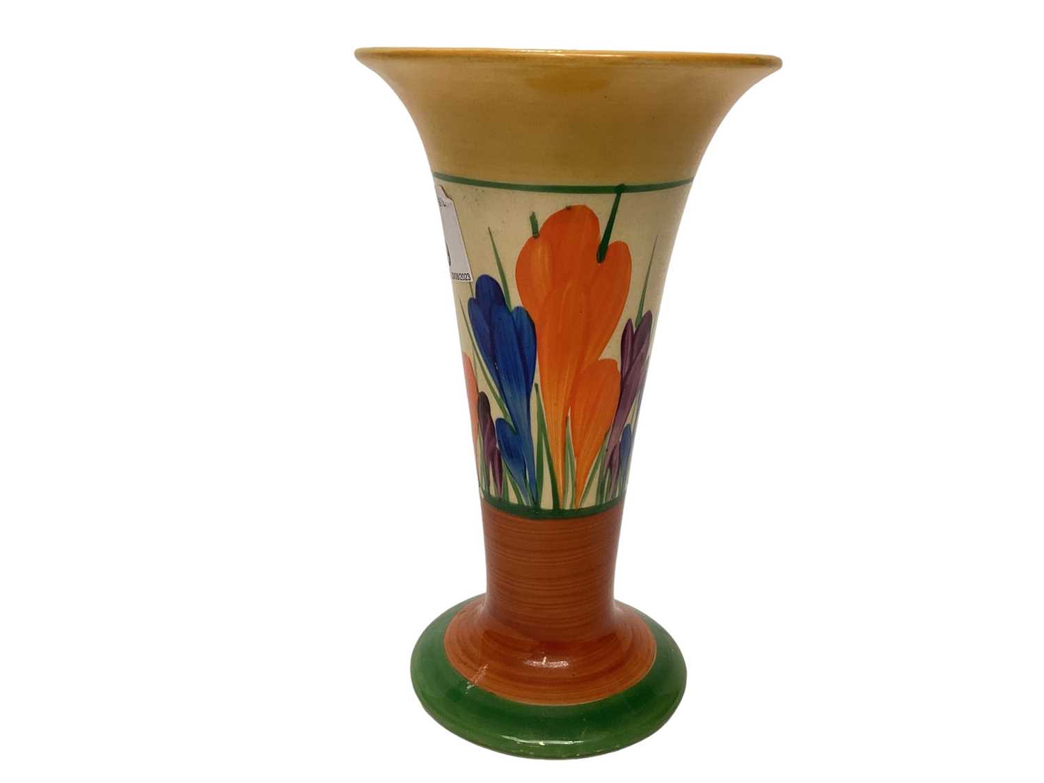 Lot 1159 - Clarice Cliff Bizarre range Crocus pattern vase with hand painted decoration, 15.5cm high