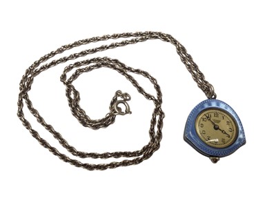 Lot 39 - 1920s silver and blue guilloche enamel pendant watch on chain, signed C. Bucherer