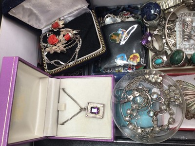 Lot 40 - Group of silver and white metal jewellery to include silver gem set rings, silver and moonstone bracelet, earrings and rings, silver charm bracelet, white metal charm necklace, silver bangles e...