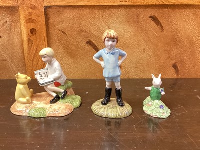 Lot 1189 - Eleven Royal Doulton Winnie The Pooh figures - Christopher Robin, Winnie The Pooh and the Paw-Marks, Christopher Reads to Pooh, Rabbit Reads the Plan, Christopher Robin and Pooh, Pooh and Piglet th...