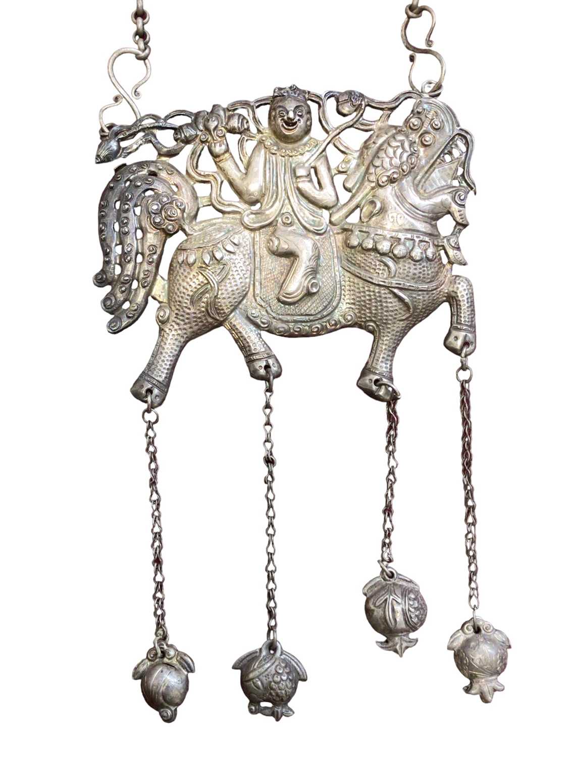 Lot 4 - Old Chinese white metal necklace with a pierced and embossed plaque depicting a figure on a dragon/horse, with bells suspended on chains from the hooves. Plaque measures approximately 13cm x 11cm