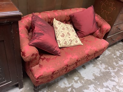 Lot 1361 - Victorian sofa with buttoned red upholstery on turned front legs, 130cm wide approximately