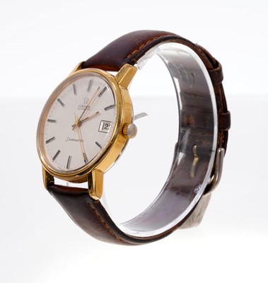 Lot 553 - 1970s Gentlemen's Omega Automatic Seamaster wristwatch with date aperture at the 3 o'clock position, baton hour markers and centre seconds, in a gold plated circular case, on leather strap.