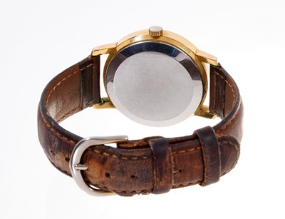 Lot 553 - 1970s Gentlemen's Omega Automatic Seamaster wristwatch with date aperture at the 3 o'clock position, baton hour markers and centre seconds, in a gold plated circular case, on leather strap.