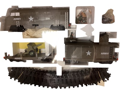 Lot 1891 - Timpo Modern Army Train Set, No.245 & Comando Raid Modern Army, No.313, both boxed, plus Soldier and Heroes in Action military figurines (5)