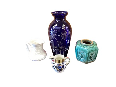 Lot 1295 - Two Victorian Ironstone jugs, Victorian Parian jug, another jug, ginger jar and a blue glass vase