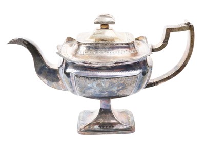 Lot 282 - George III silver teapot of shaped rectangular form, with engraved decoration, crest and initials