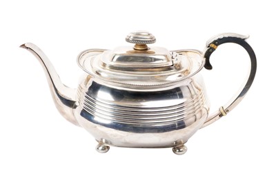 Lot 308 - George III silver teapot of bellied form, with reeded girdle and leaf mounted silver handle