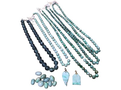 Lot 16 - Five Chinese green hard stone/ jade spherical polished bead necklaces, together with some loose beads and two green hard stone/ jade carved plaque pendants