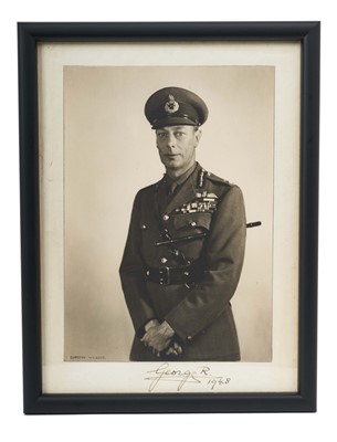 Lot 110 - H.M. King George VI, signed presentation portrait photograph by Dorothy Wilding of the King in Field Marshalls uniform and with a baton under his arm