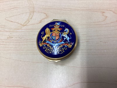 Lot 21 - H.M. Queen Elizabeth II, 2002 Halcyon Days enamel Golden Jubilee commemorative Royal Household Christmas present decorated with Royal Arms and inscription 15 cm diameter