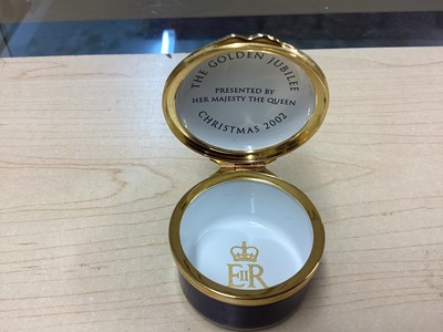 Lot 21 - H.M. Queen Elizabeth II, 2002 Halcyon Days enamel Golden Jubilee commemorative Royal Household Christmas present decorated with Royal Arms and inscription 15 cm diameter