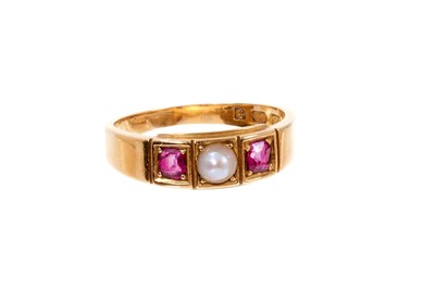 Lot 467 - Victorian 18ct gold ruby and pearl three stone ring, Birmingham 1880.