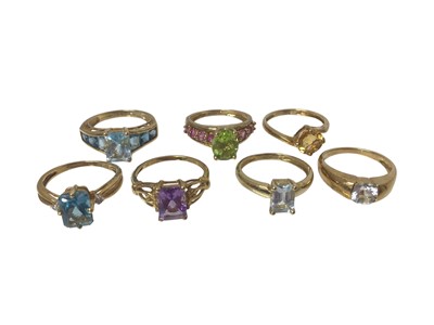 Lot 97 - Seven 9ct gold single stone multi-gem set rings