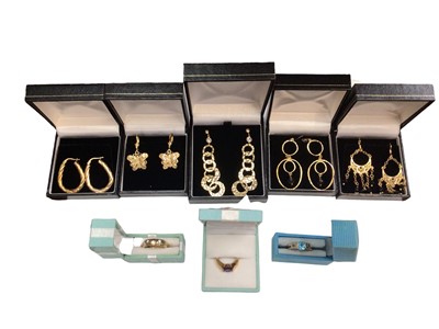 Lot 100 - Group of silver gilt jewellery to include five pairs of earrings and three gem set rings, all boxed