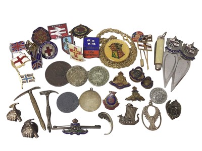 Lot 116 - Silver and enamelled military brooch, two silver pick axe charms, two silver hammer and rock pins, together with other pins and badges etc