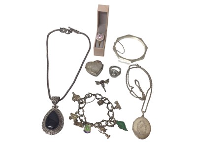 Lot 109 - Silver heart pill box, octagonal silver bangle, silver charm bracelet, silver locket on chain, one other silver pendant on chain, two silver gem set rings and a silver marcasite dragonfly brooch