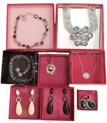 Lot 114 - Collection of eight 1980s Butler & Wilson novelty jewellery including a large floral bead necklace, other necklaces and three pairs of drop earrings, all boxed