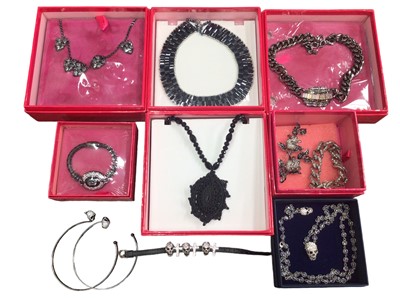 Lot 115 - Collection of 1980s Butler & Wilson novelty black and diamanté jewellery including necklaces, bracelets, double rose brooch skull jewellery, mostly boxed