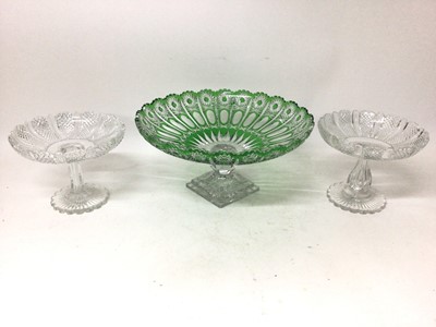Lot 29 - Pair of Victorian cut glass pedestal dishes and a good quality Bohemian green overlaid and cut glass pedestal dish (3)