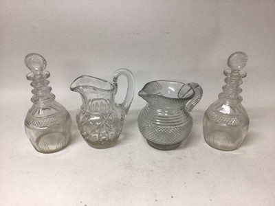 Lot 31 - Pair George III cut glass decanters, George III cut glass water jug and a Victorian cut glass water jug (4)