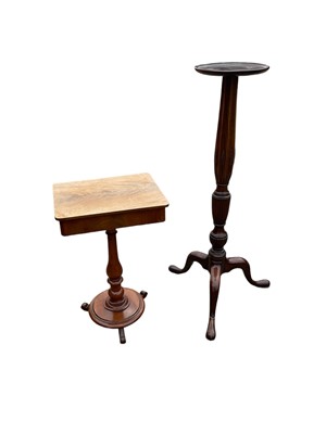 Lot 1265 - Edwardian carved mahogany pedestal plant stand and a Victorian mahogany work table with hinged rectangular top on turned pedestal with circular plateau base (2)