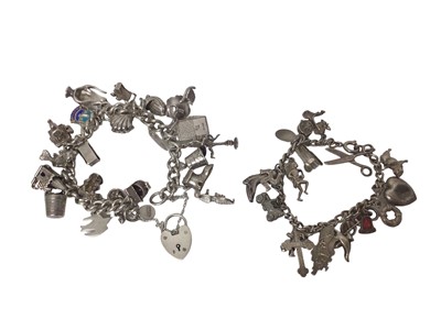 Lot 159 - Two silver and white metal charm bracelets