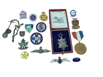 Lot 840 - First World War On War Service 1915 badge, silver RAF Sweetheart brooch, two enamelled coin brooches and other related badges.