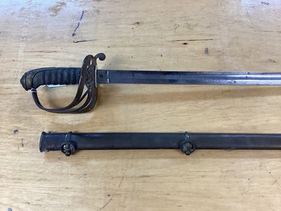 Lot 897 - Victorian 1845 Pattern Infantry Officers sword with brass gothic hilt, etched fullered blade in brass Field Officers scabbard