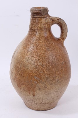 Lot 9 - German salt glazed stoneware flagon with tiger glaze, unusual impressed marks to the front, probably 17th or 18th century