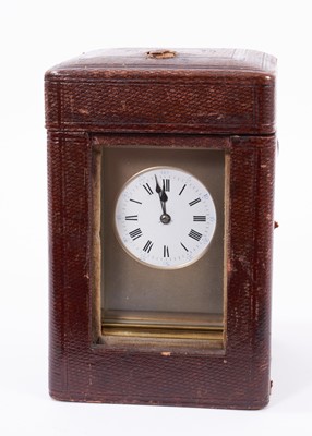 Lot 629 - Late 19th century French quarter repeating brass carriage clock in leather travelling case.