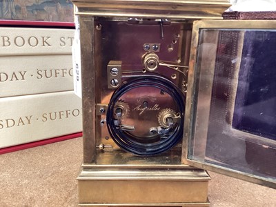 Lot 629 - Late 19th century French quarter repeating brass carriage clock in leather travelling case.