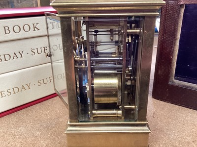 Lot 629 - Late 19th century French quarter repeating brass carriage clock in leather travelling case.