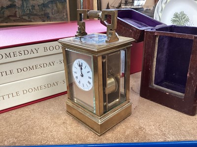 Lot 629 - Late 19th century French quarter repeating brass carriage clock in leather travelling case.