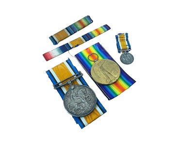 Lot 755 - First World War pair comprising War and Victory medals named to 276404 PTE. W. C. Ward. Durh. L. I., a miniature War medal and mounted ribbons.