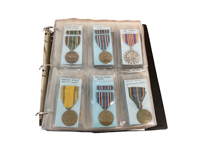 Lot 771 - Large collection of American First World War, Second World War and later campaign medals, housed in an album (approximately 54 medals)