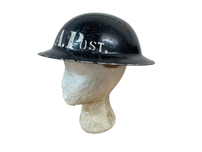 Lot 773 - Second World War British Military MKII Steel Helmet with black painted finish and 'F.A.P' (First Aid Post) to front, with chinstrap and liner, dated under brim 1940