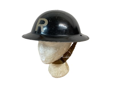 Lot 774 - Second World War British Military MKII Steel Helmet with black painted finish and 'R' to front, with chinstrap and liner, dated under brim 1941