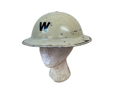 Lot 776 - Second World War British Military MKII Steel Helmet with cream painted finish and 'W' (Warden) to front, with chinstrap and liner, stamped under brim