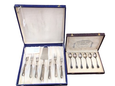 Lot 194 - Set of six Italian silver teaspoons in case, together with a cake set with silver (900) handles, also cased