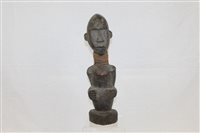 Lot 2802 - African Carsved wood figure, 44cm high