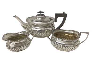 Lot 208 - Three piece early George V silver tea set